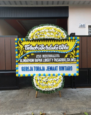 Papan Bunga Duka di Suriamukti